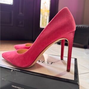 Nine West Pink Suede Pumps
They were worn once.

HEEL HEIGHT: 3.98
